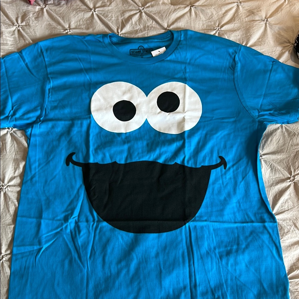 Blue Graphic T-Shirt with Fun Face Design